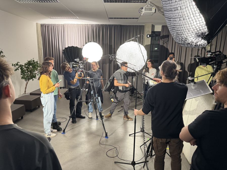 A crew on a lit set during a Movie Sprint.