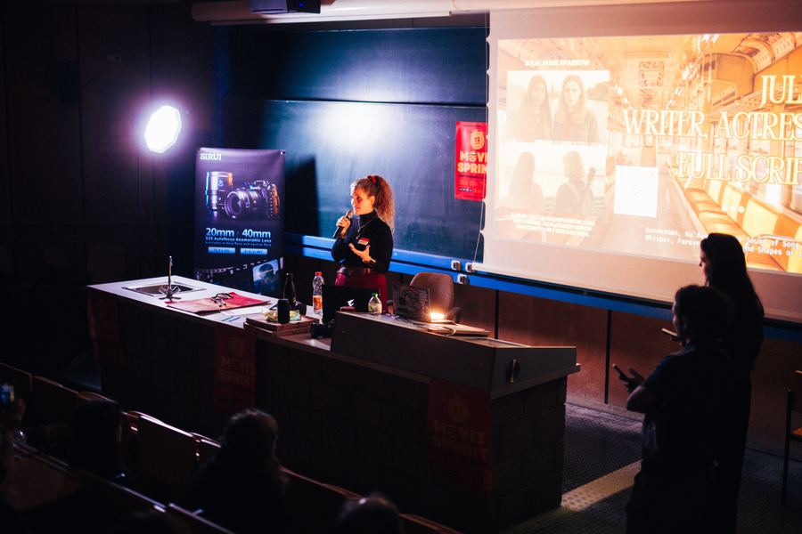 On stage during a Movie Sprint presentation.